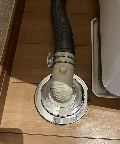 洗濯機の排水口の詰まり解消