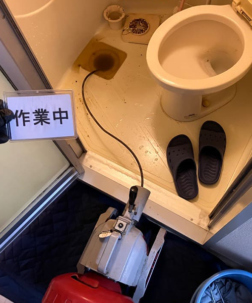 排水溝の詰まり解消作業