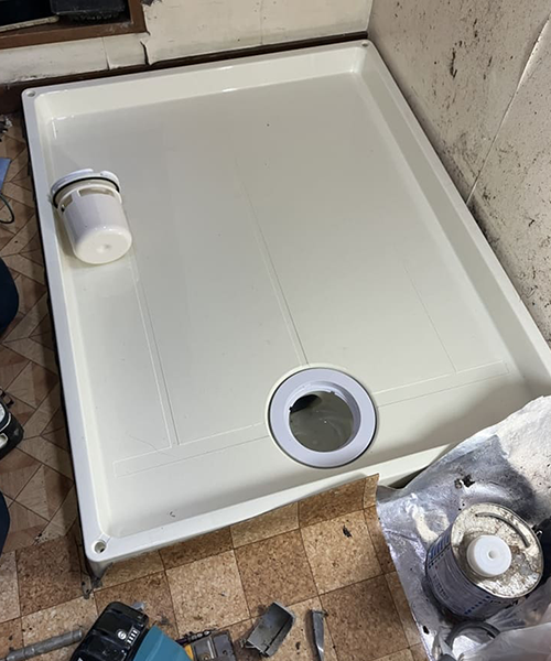 洗濯パンの交換作業